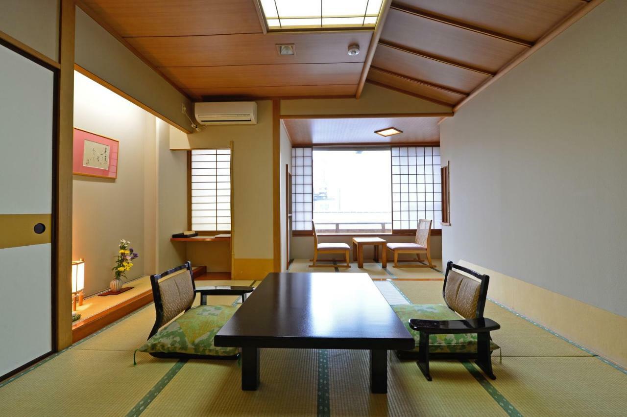 Osakaya Ryokan Кусацу Экстерьер фото